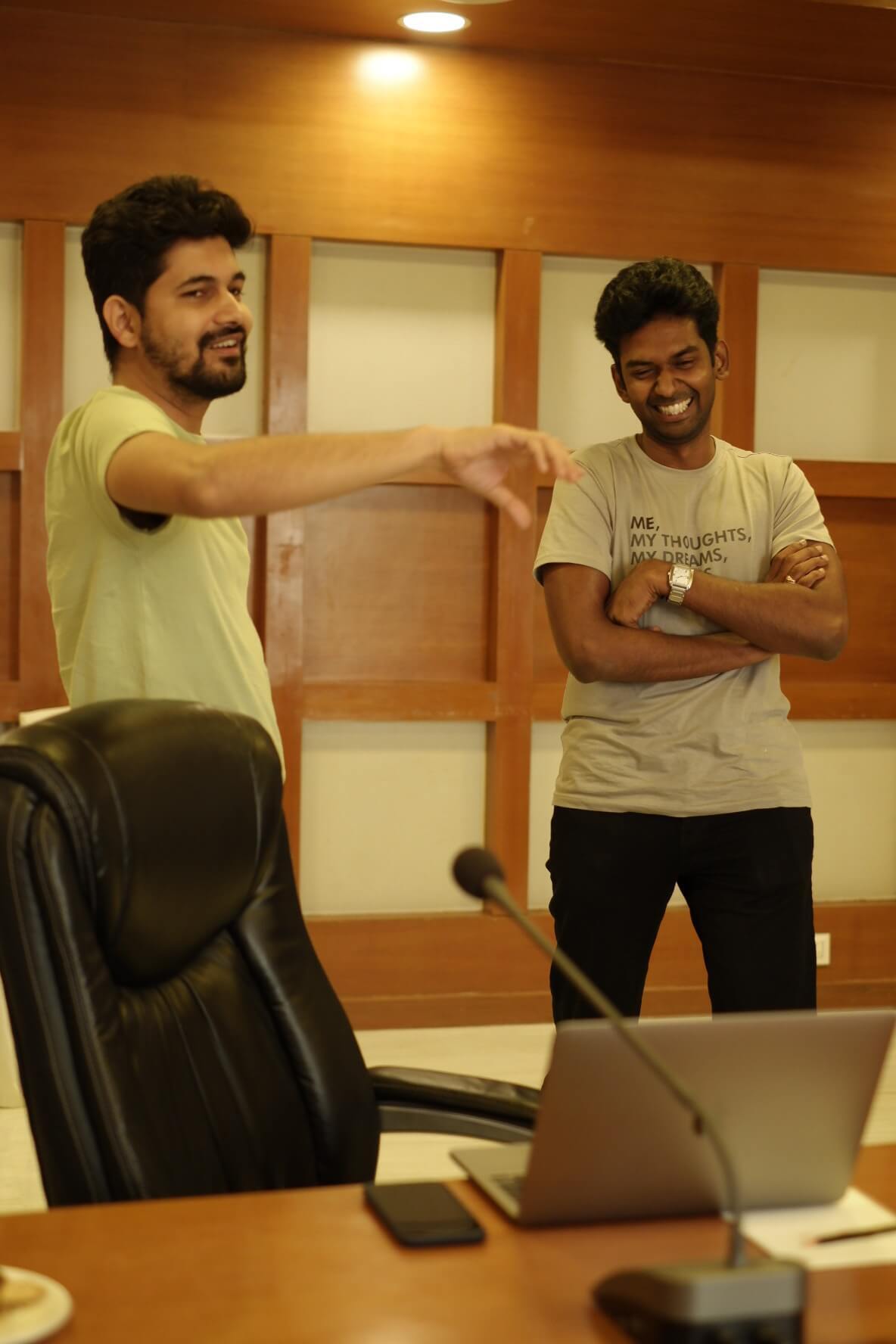 Ganesh and Sudhakar in the conference room having a fun time